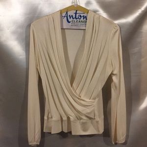 Cream colored Carriere Studio top size L